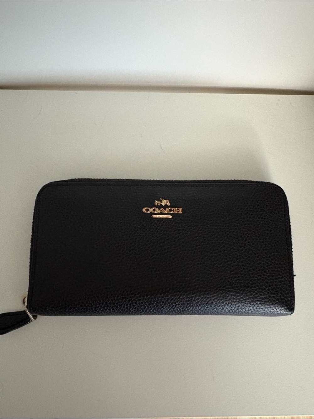 Coach Black Pebbled Zip-Around Wallet with Gold Logo